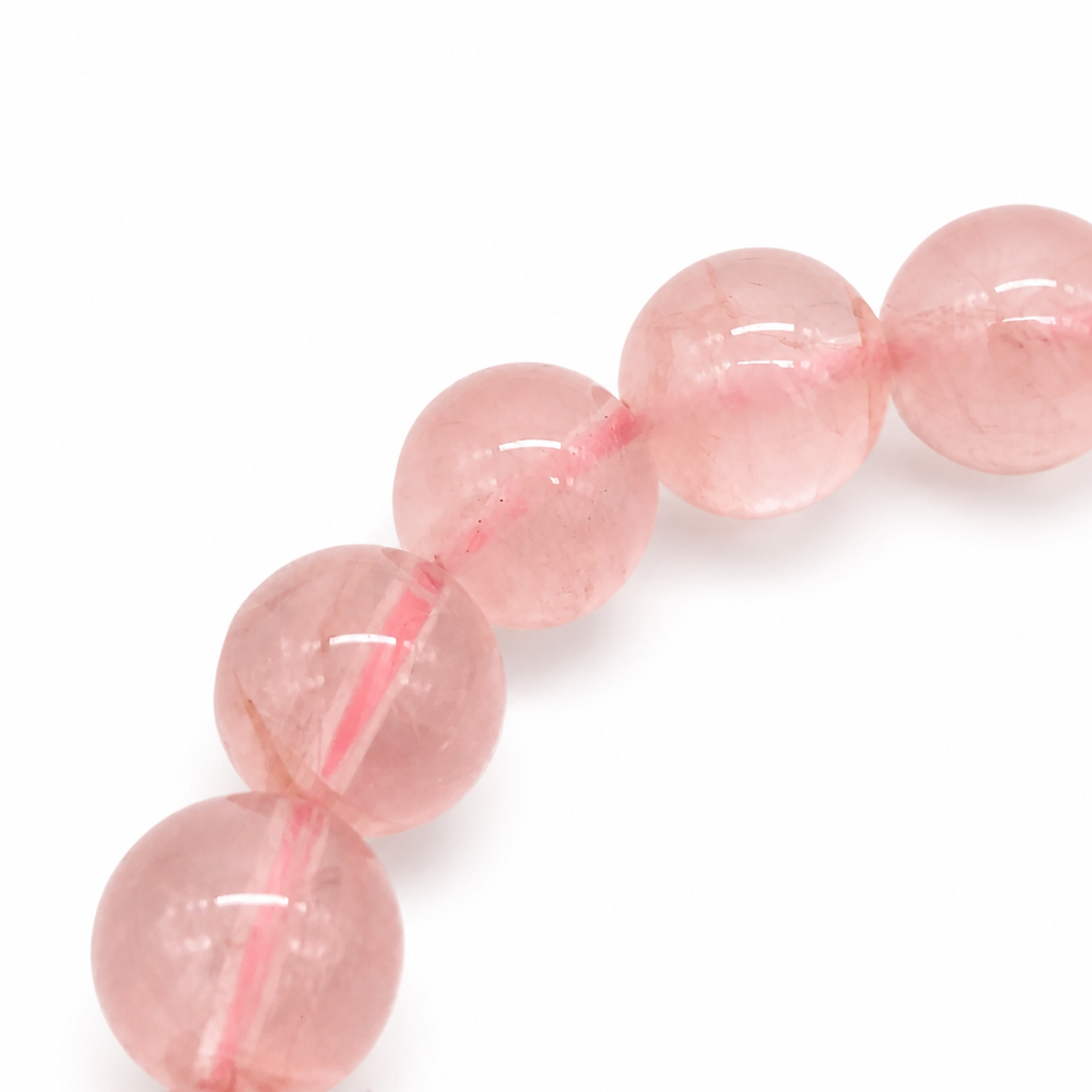 Premium rose quartz bracelet curved on white