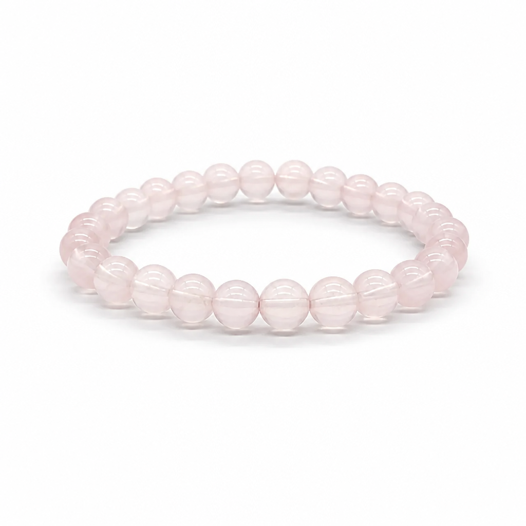 Star Rose Quartz bracelet Style A with cool lavender-pink 7mm beads showing six-rayed asterism star