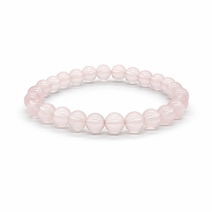 Star Rose Quartz bracelet Style A with cool lavender-pink 7mm beads showing six-rayed asterism star