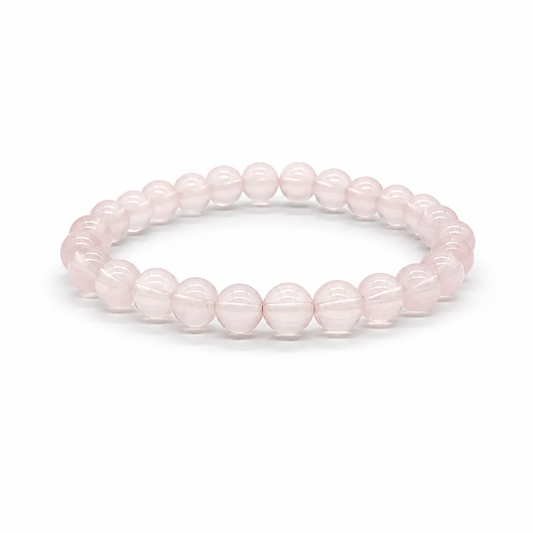 Star Rose Quartz bracelet Style A with cool lavender-pink 7mm beads showing six-rayed asterism star