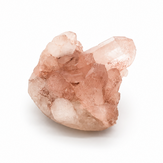 Mini Pink Samadhi Quartz cluster with dense radiating points on a white surface