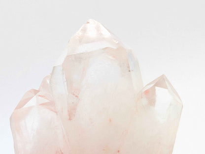 Pink Samadhi Quartz cluster back view showing natural base and cluster spread
