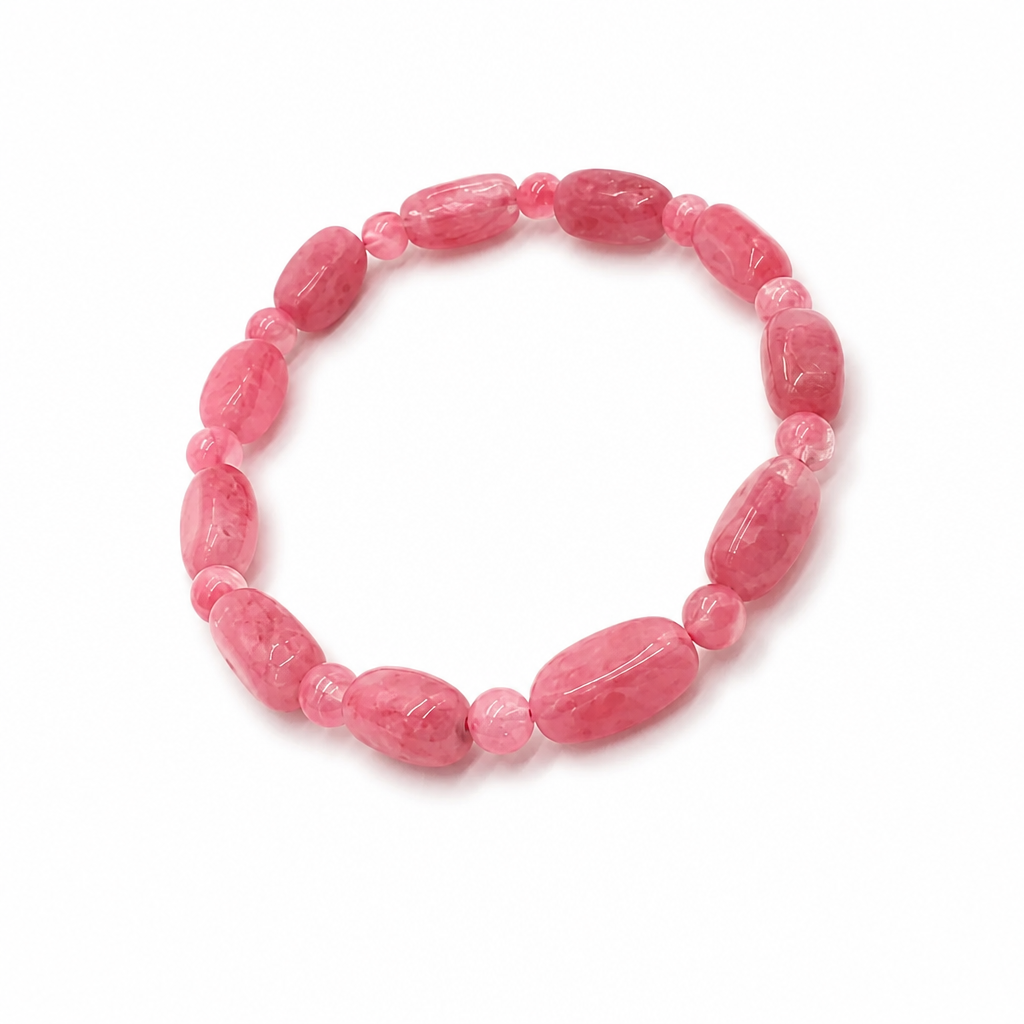 Rhodonite freeform bracelet on a white background