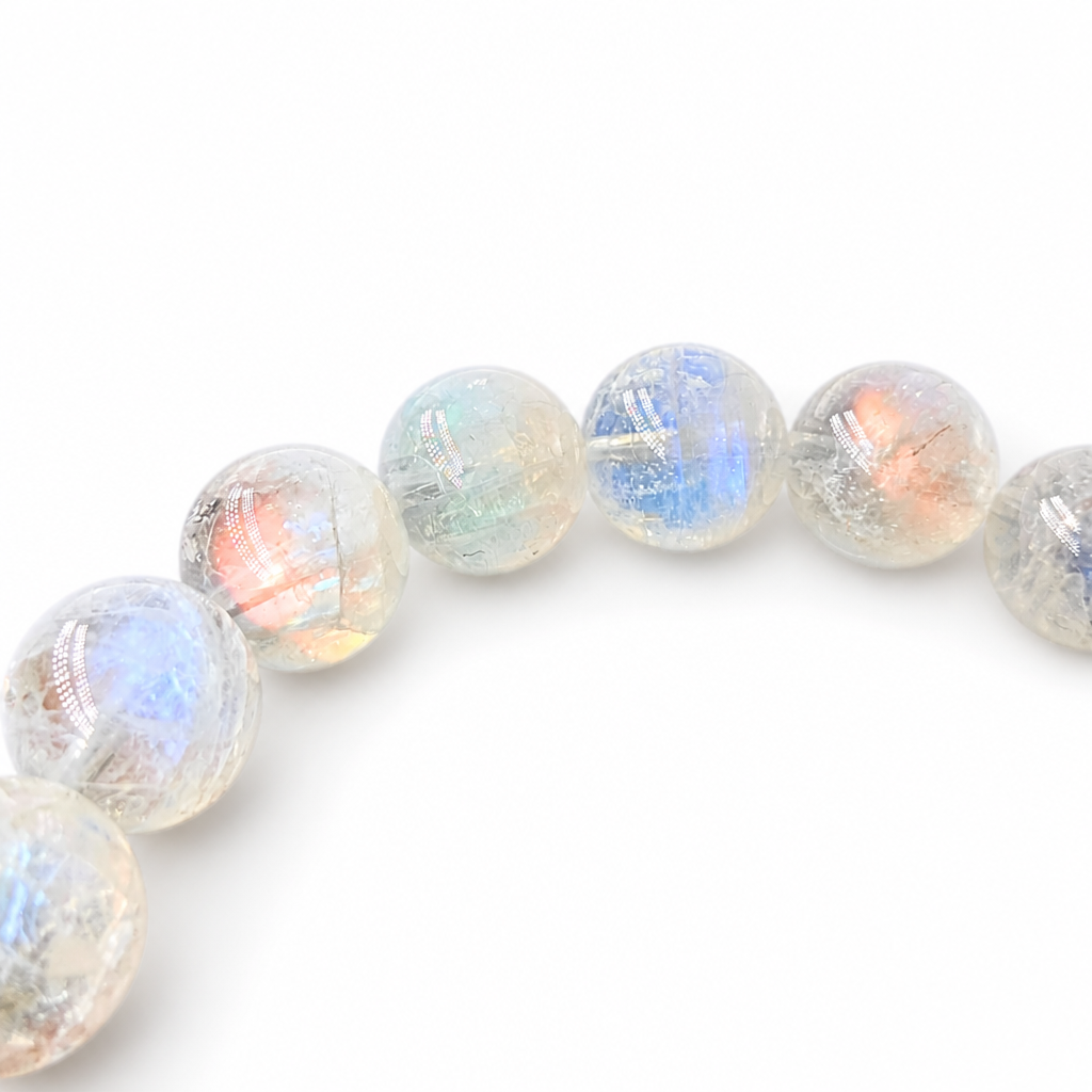 Milky white body of Madagascar Moonstone with rosy adularescence in natural daylight