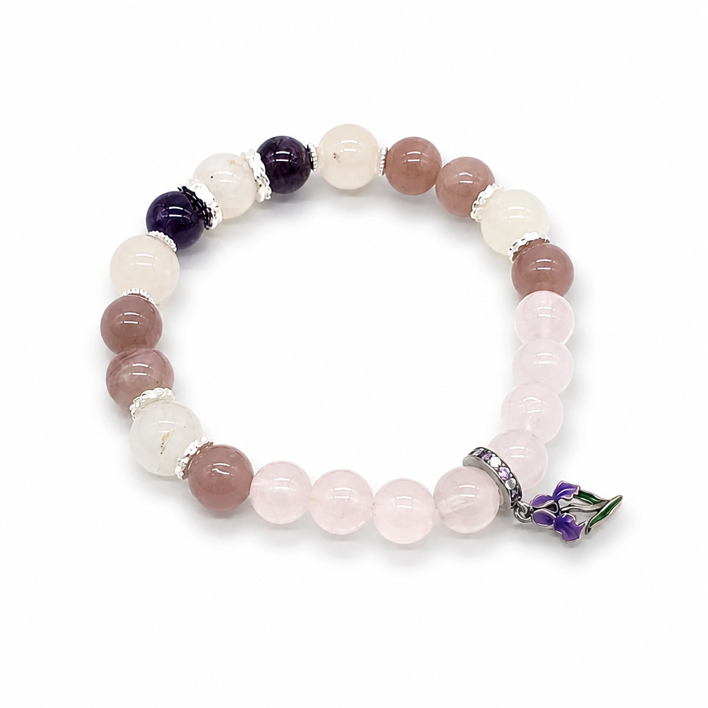 Soft blush Madagascar rose quartz beads contrasting with deep violet amethyst on white