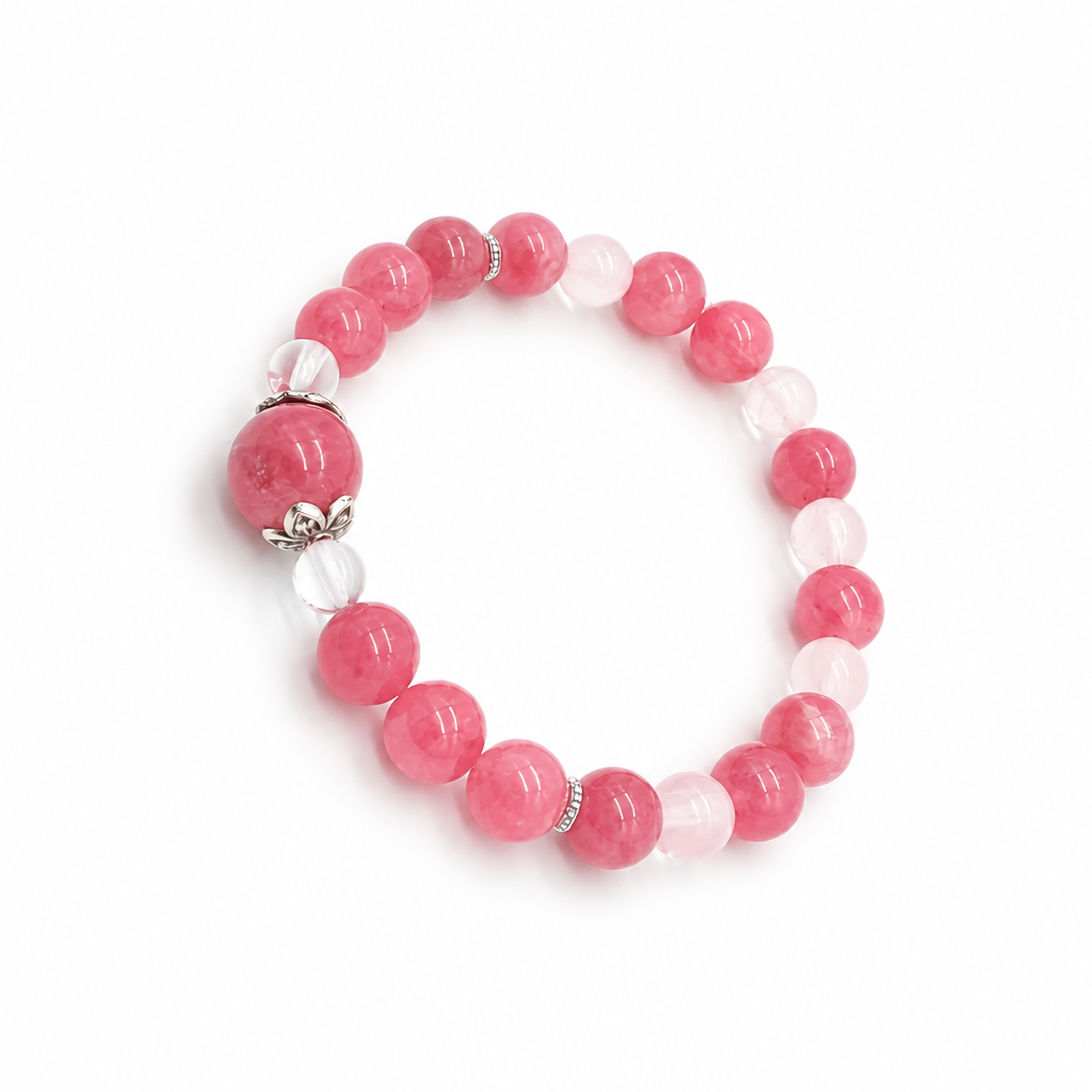Heart Sanctuary designer bracelet worn on the wrist showing warm pink and soft blush tones