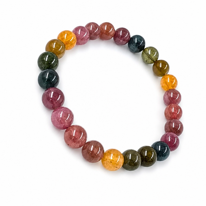Full bracelet circle of Rainbow Tourmaline showing rose green teal gold indigo spectrum