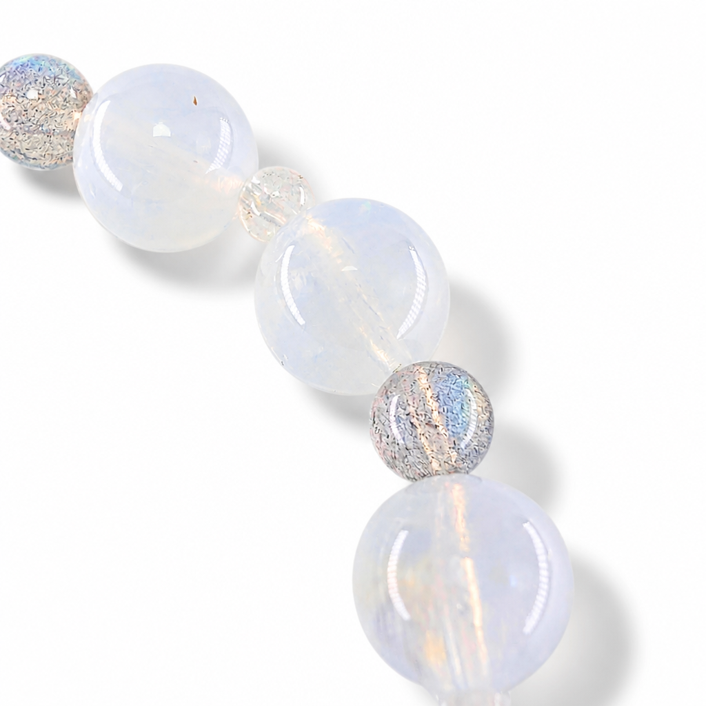 Side view of the Moon Tide Full Moon bracelet showing rich bead presence and sheen