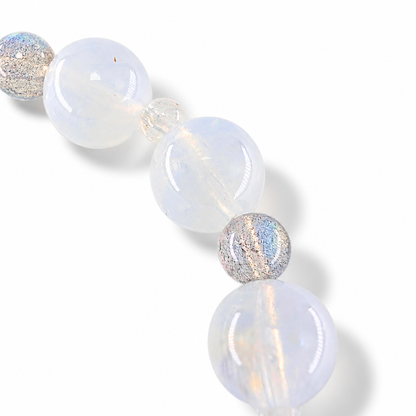 Side view of the Moon Tide Full Moon bracelet showing rich bead presence and sheen