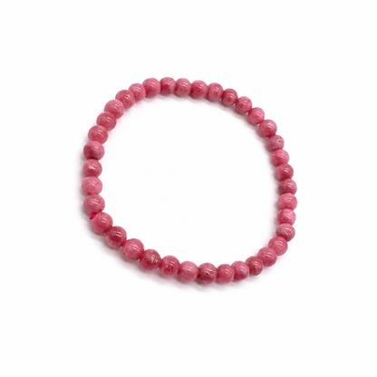Delicate 5mm rhodonite layering bracelet on white