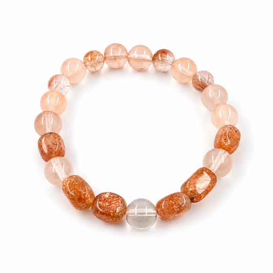 Sunstone and Rabbit Hair Quartz bracelet with warm amber and rose-gold tones on white