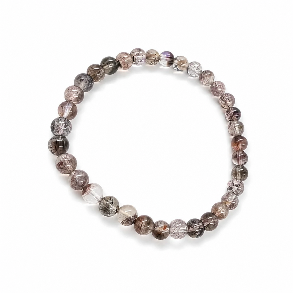 Black Super Seven bracelet worn on the wrist showing near-black mineral complexity