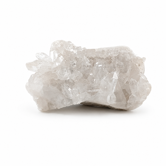 Natural Clear Quartz cluster showing dozens of points rising from a shared mineral base