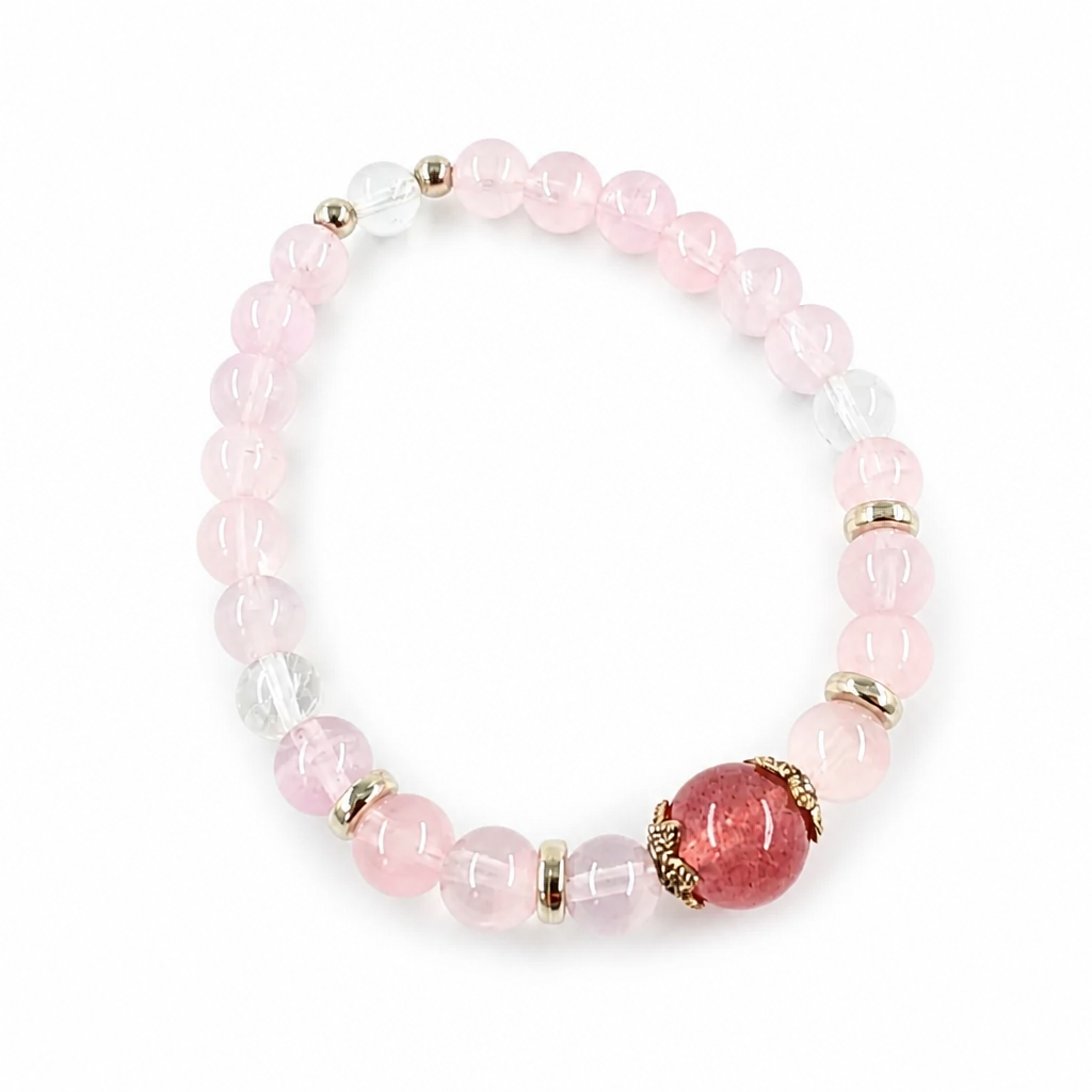 Soft blush Rose Quartz petals around the focal bead, detail view