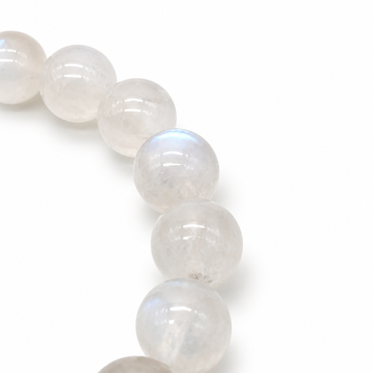 Glassy silvery-white moonstone beads catching blue light