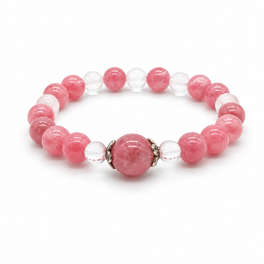 Close-up of bold rose-pink rhodonite beads with distinctive black manganese veining