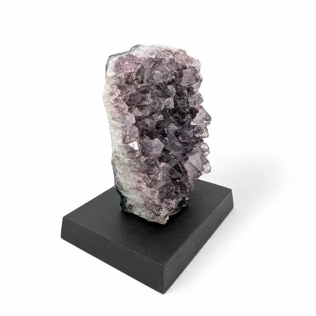 Detail of the violet phantom shadow visible inside the amethyst spire crystal