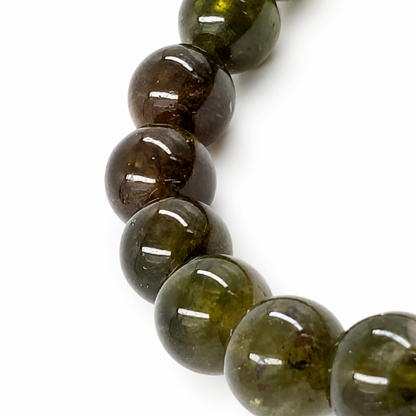 Green Tourmaline Verdelite bracelet resting flat showing even bead selection