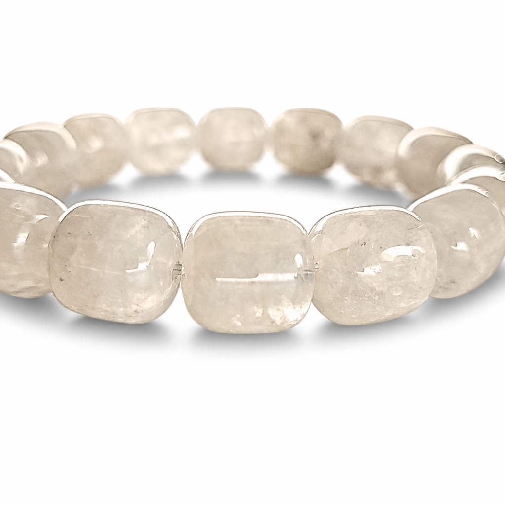 Garden Quartz lodolite bracelet worn on the wrist showing wide barrel bead window onto inner landscape