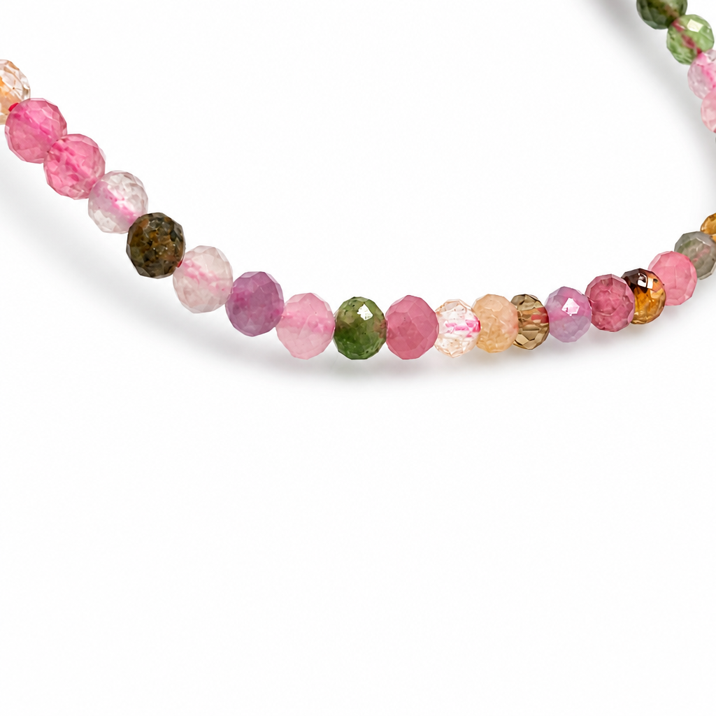 3mm faceted tourmaline beads scattering colour on elastic cord