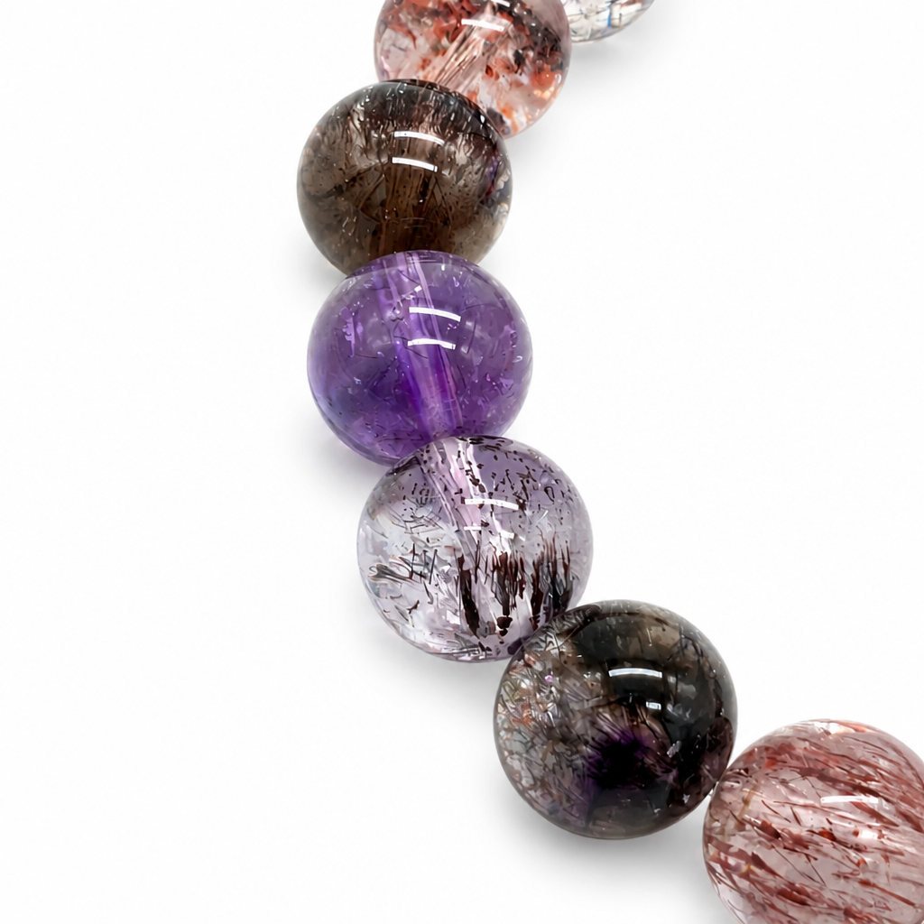 Ultra-clear Super 7 bracelet held to the light