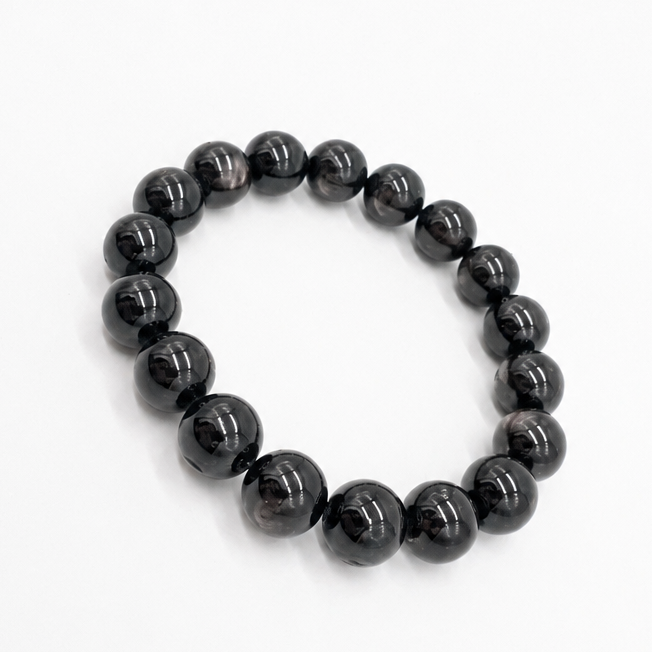 Full bracelet circle of the Hypersthene Schiller showing even bead size and colour
