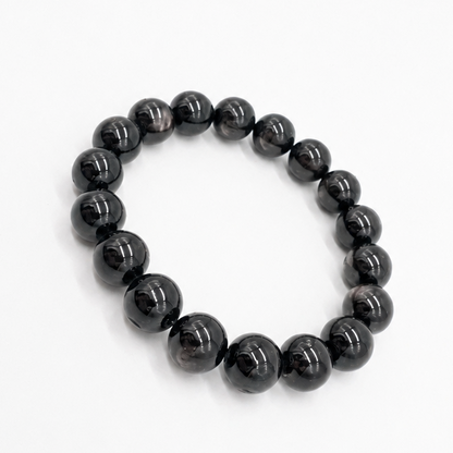 Full bracelet circle of the Hypersthene Schiller showing even bead size and colour