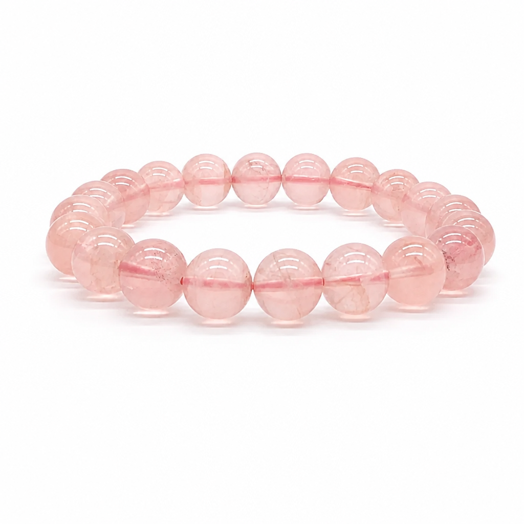 Bold 9.5mm rose quartz beads on a white background