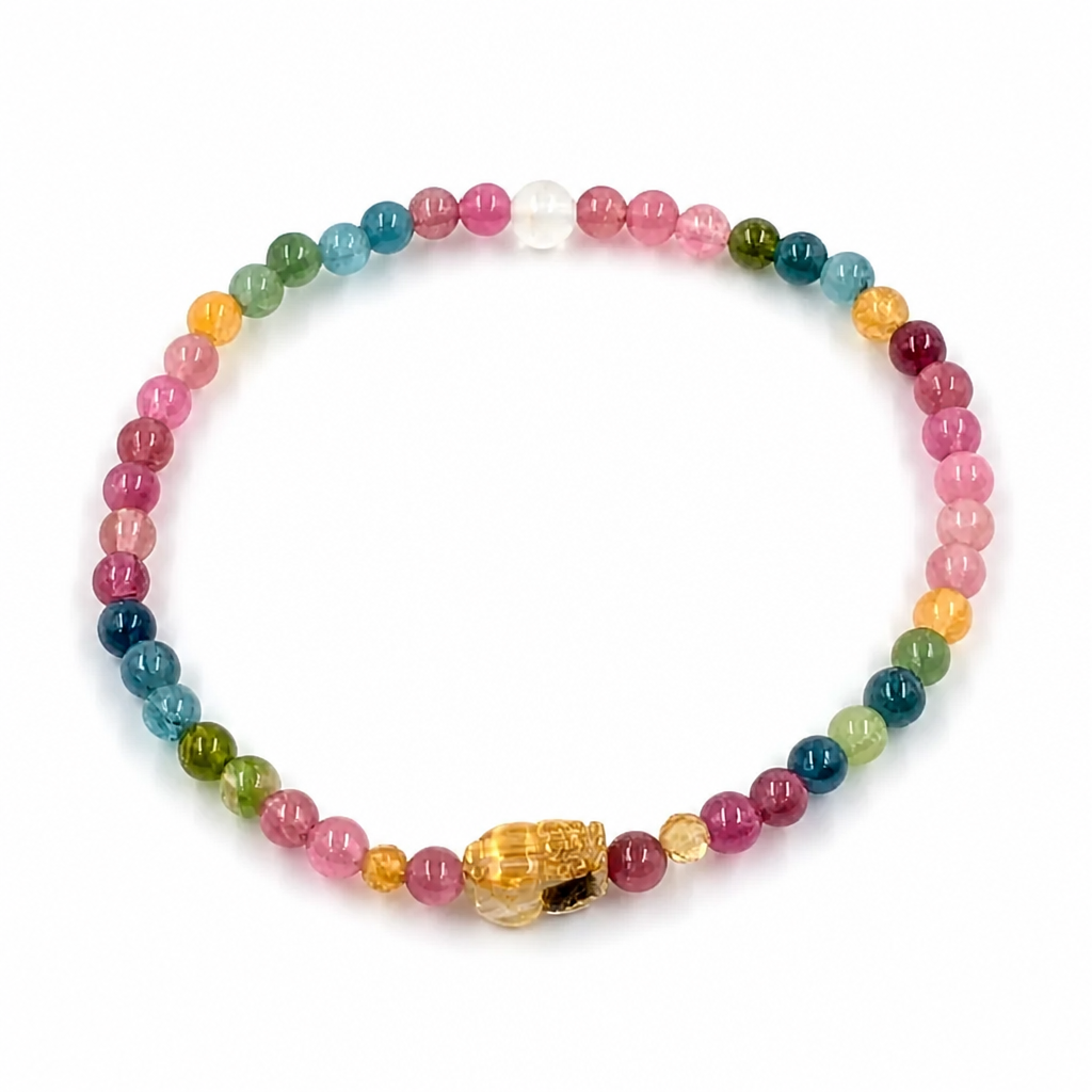 Full circle of the Pixiu Tourmaline Rainbow bracelet showing colour spectrum