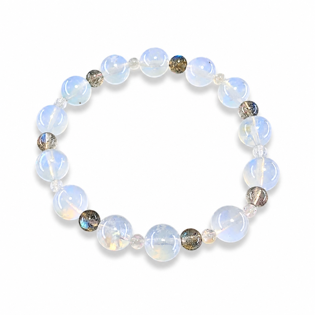 Soft white to grey Indian Moonstone beads with bold silvery-blue adularescence on white