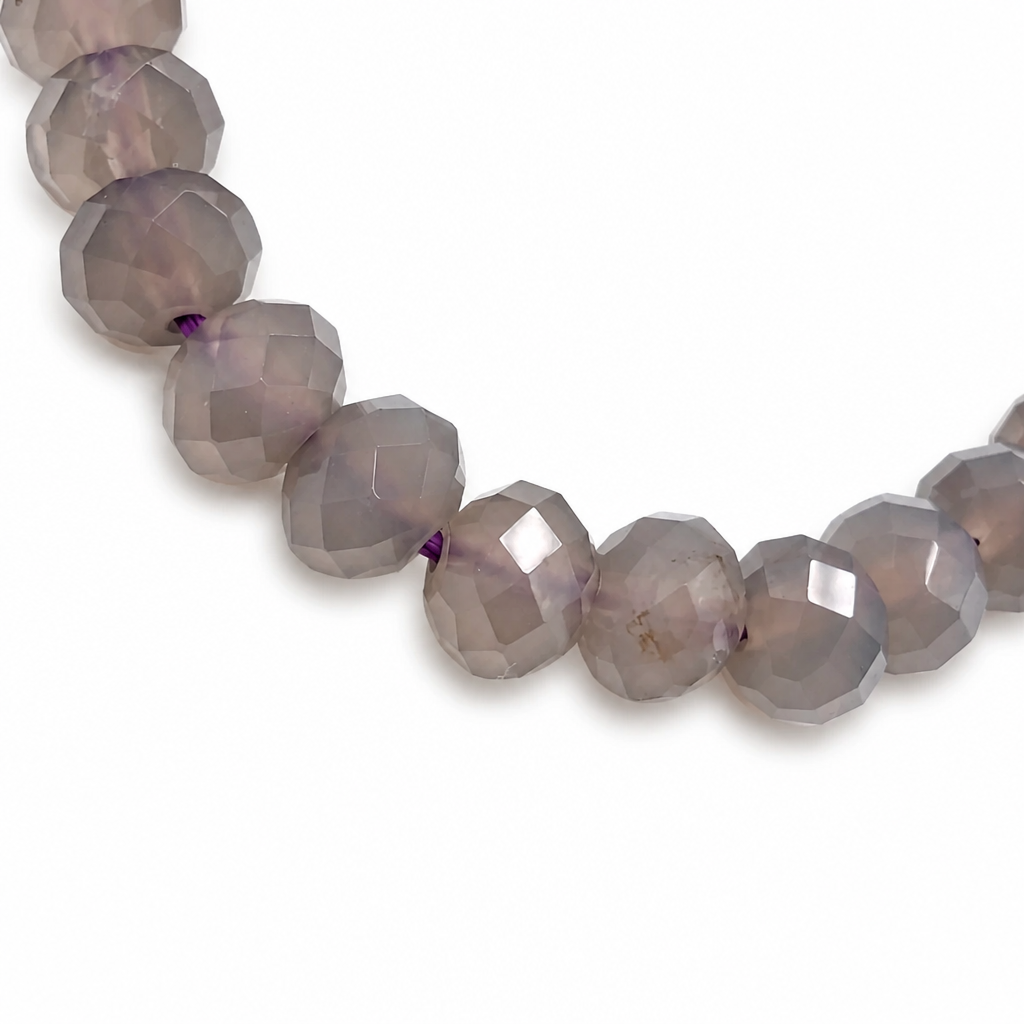 Waxy purple chalcedony beads on elastic cord