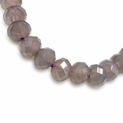 Waxy purple chalcedony beads on elastic cord