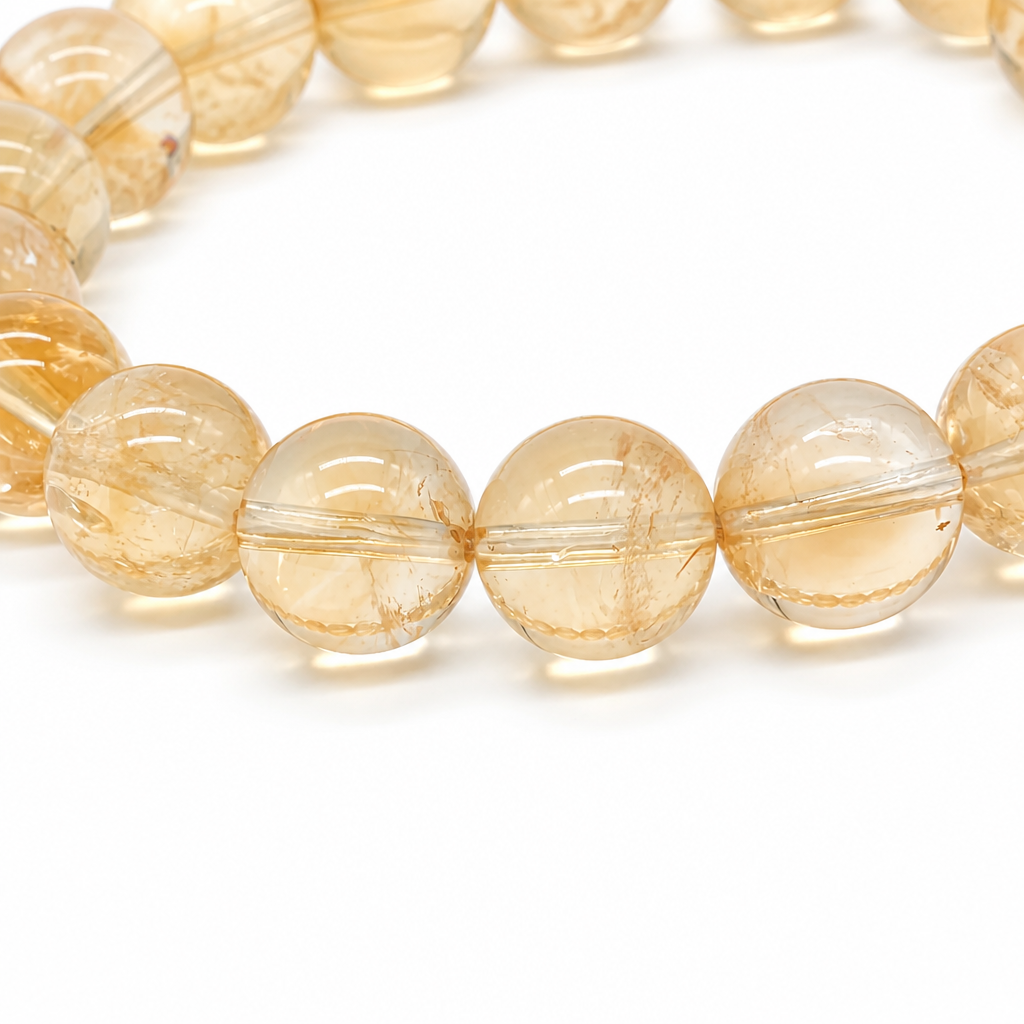 Honey-gold citrine bead showing natural colour