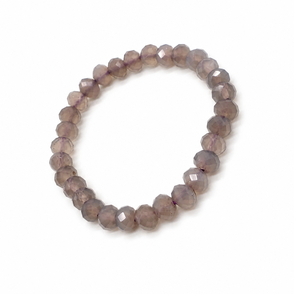 Purple chalcedony Royal Stone bracelet on a white background