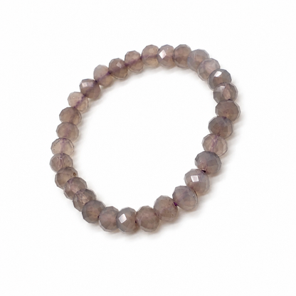 Purple chalcedony Royal Stone bracelet on a white background