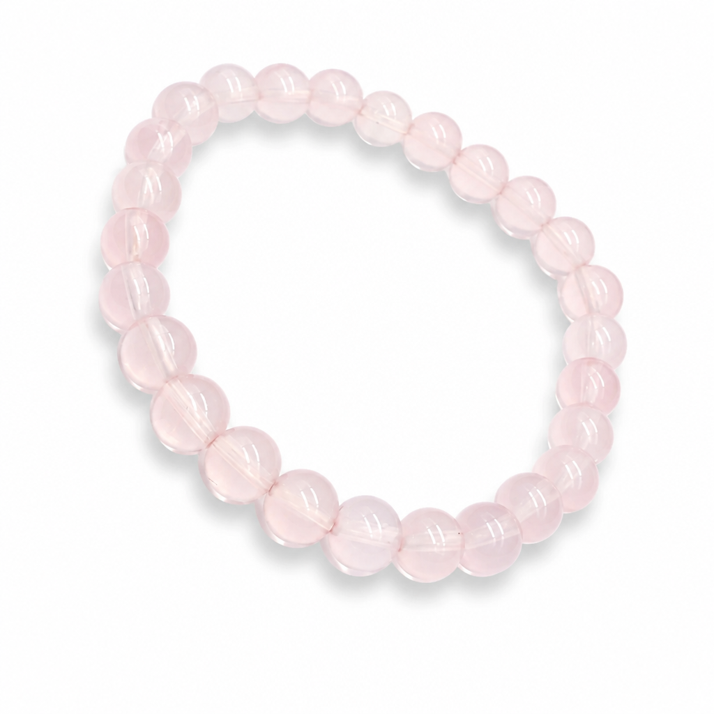 Close-up of six-rayed asterism star drifting across a Madagascar Star Rose Quartz bead in direct light