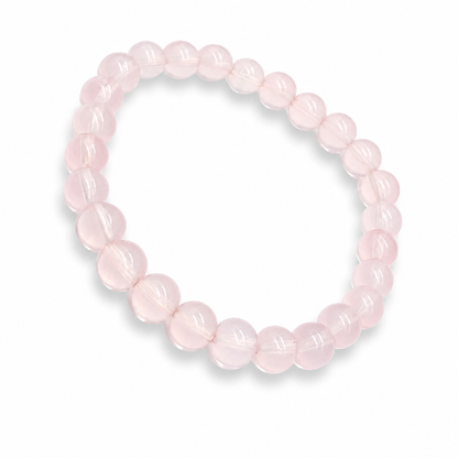 Close-up of six-rayed asterism star drifting across a Madagascar Star Rose Quartz bead in direct light