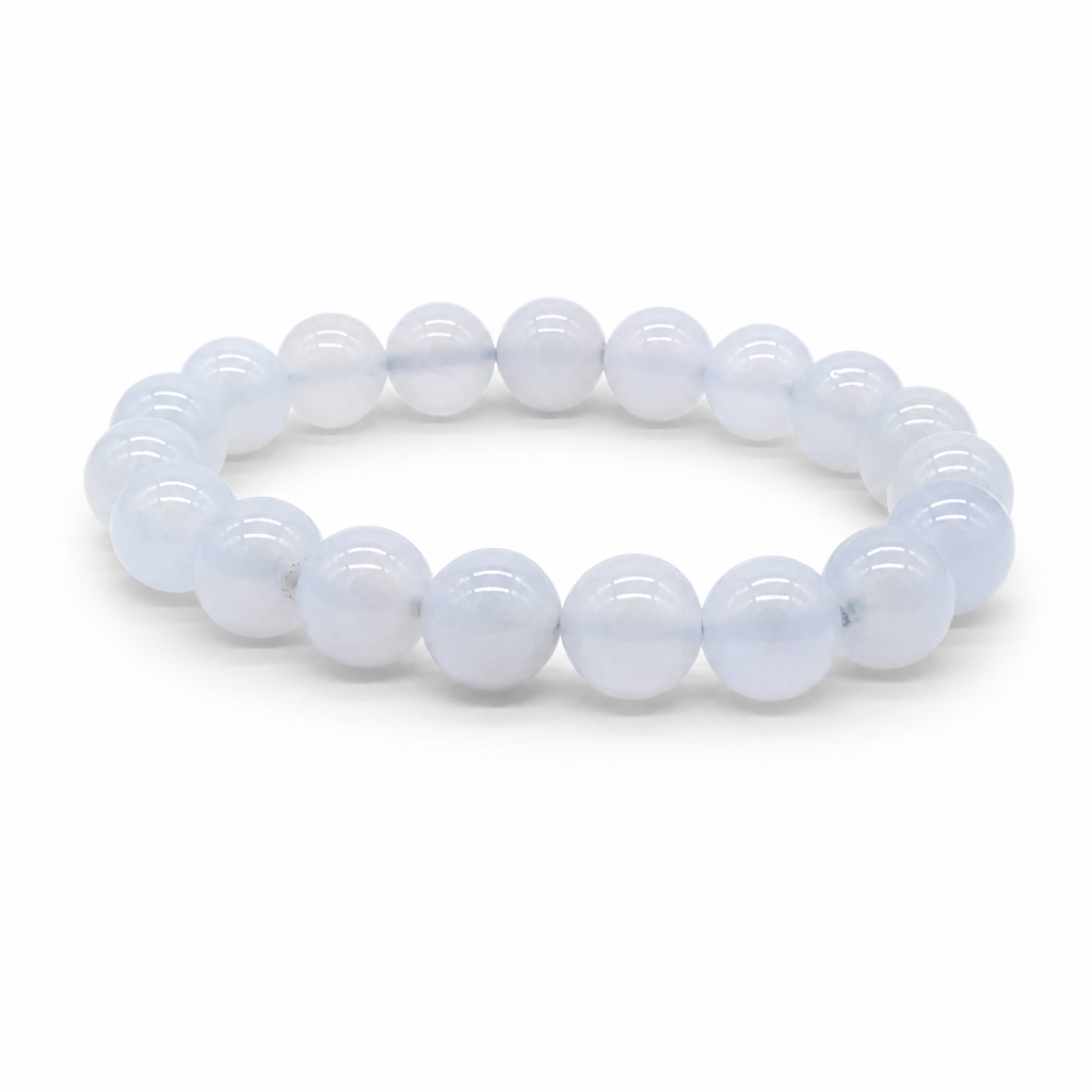 Blue Chalcedony bracelet worn on the wrist showing cool sky-blue tone and substantial 10mm bead presence
