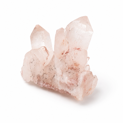 Tall Pink Samadhi Quartz cluster with upward-reaching crystal points on a white surface