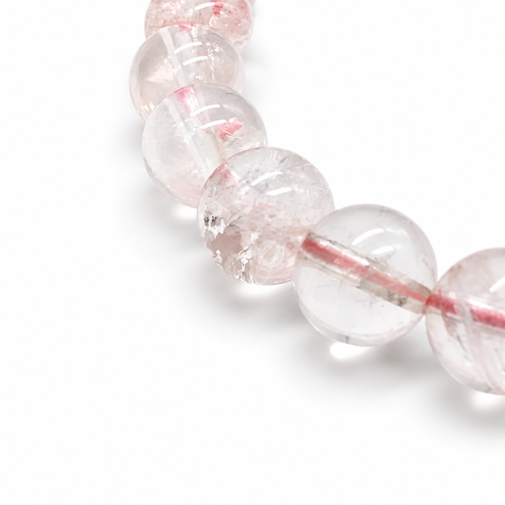 Side view of the Madagascar Ice Rose Quartz bracelet showing 7.5mm bead clarity
