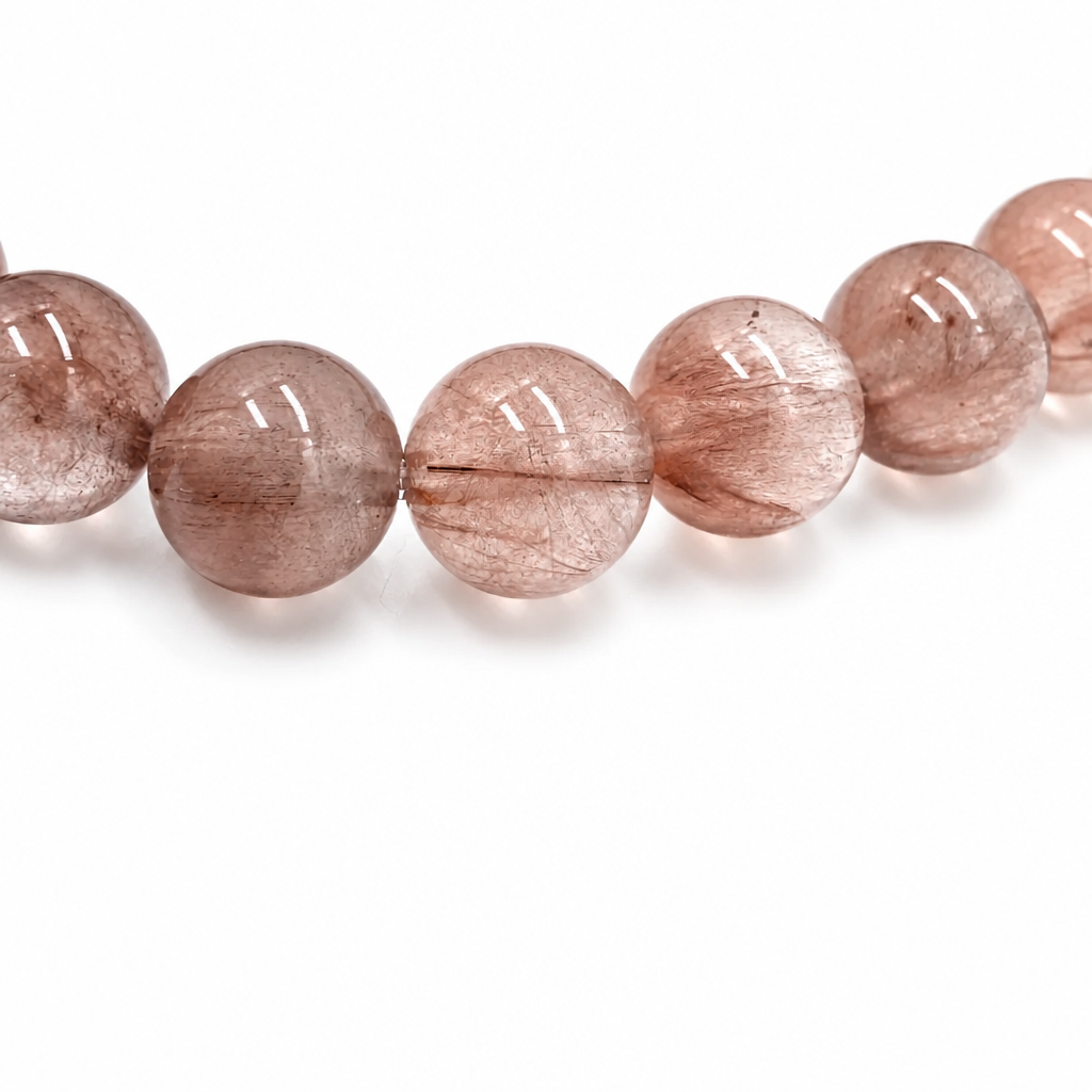 7mm rabbit hair quartz beads with red fibres on elastic cord