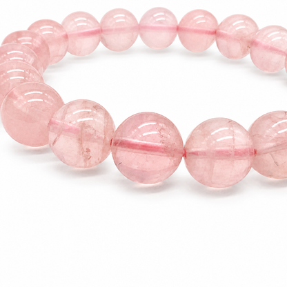 Premium Mozambique rose quartz bracelet shown from the side
