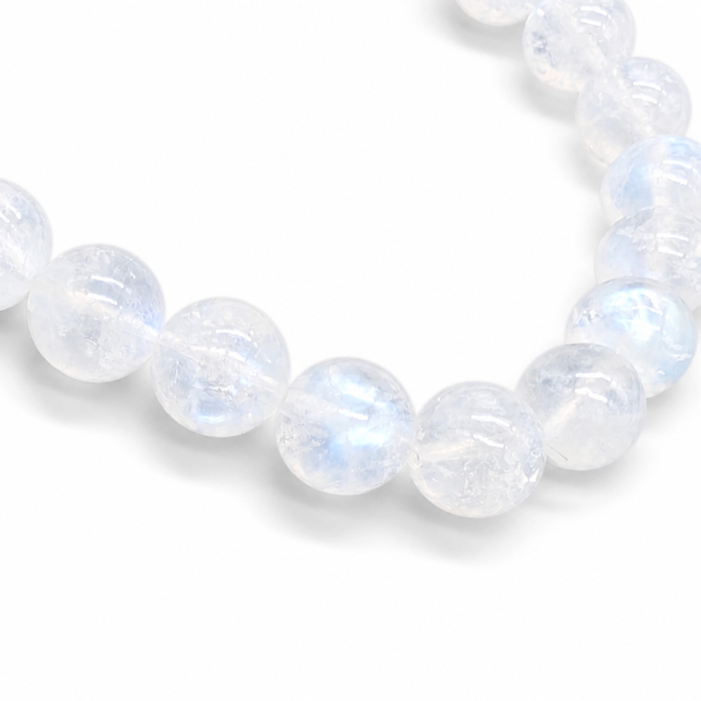 Full bracelet circle of Indian Moonstone showing milky-opaque white and blue-peach glow