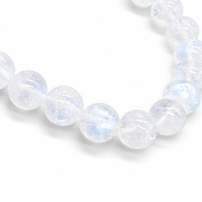 Full bracelet circle of Indian Moonstone showing milky-opaque white and blue-peach glow