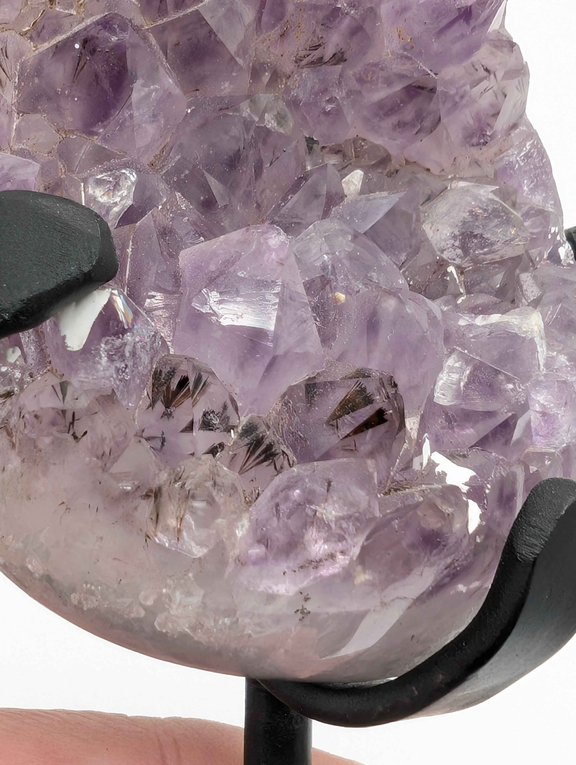 Angled view of the Brazilian Amethyst druzy spire revealing phantom core within points