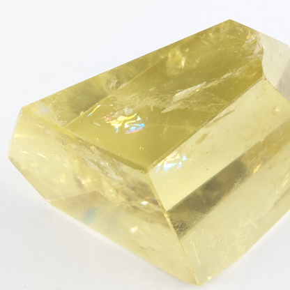 Close-up of natural facets on a raw Brazilian Citrine crystal point