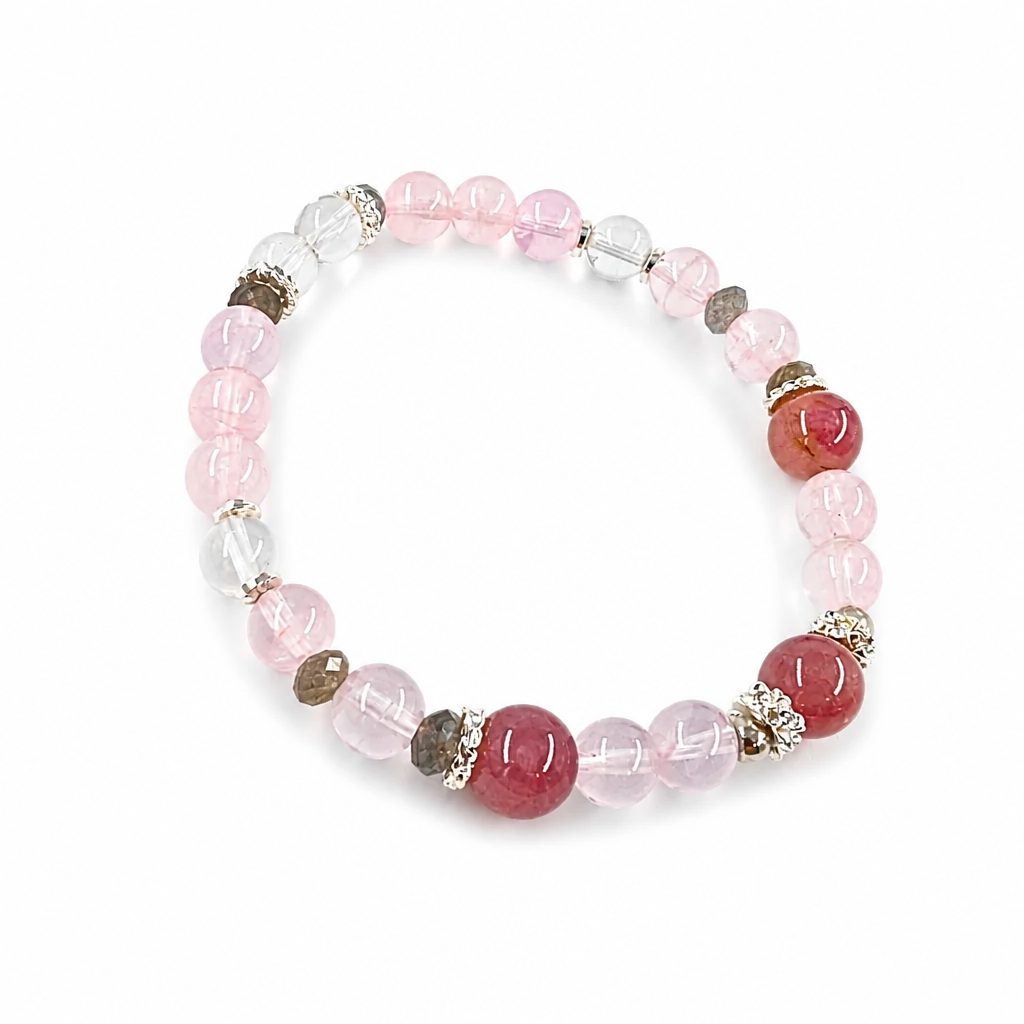 Silver-toned crown spacer between pale quartz beads