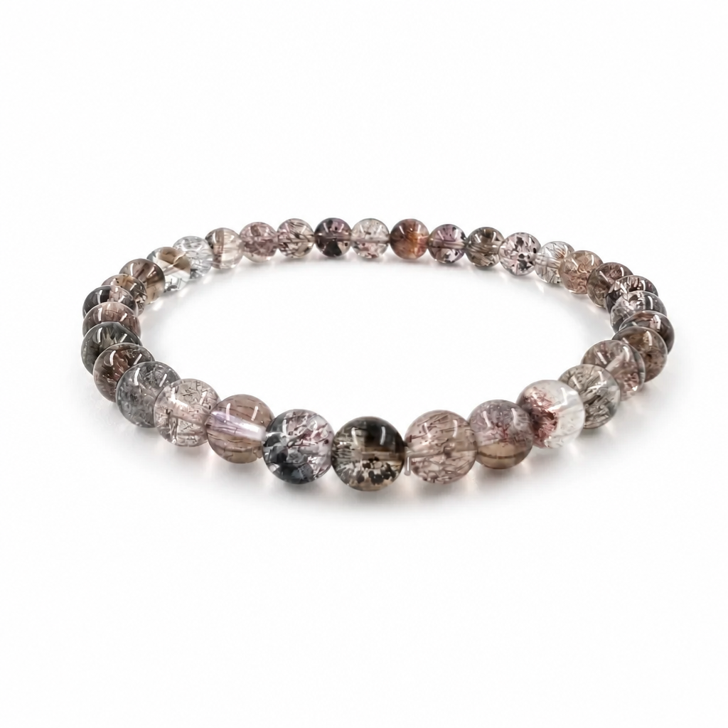 Black Super Seven bracelet with near-black Melody Stone 5.5mm beads on white