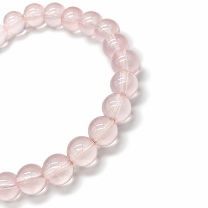 Handmade Madagascar Star Rose Quartz pure crystal bracelet by AuraLune Crystal on white background