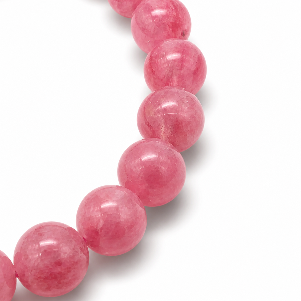 8.5mm rhodonite beads with bold black manganese veining on elastic cord